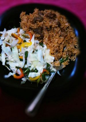 A picture of Pilau with vegatables.