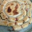 Masa, salchicha y volvan de queso