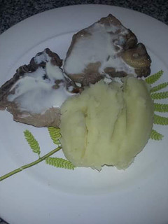 Una foto de Carre de cerdo con puré de papas