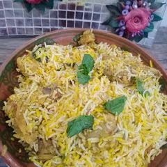 A picture of Chicken tikka biryani.