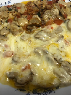 Una foto de Champiñones con mozzarella 🍄