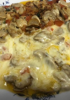 Una foto de Champiñones con mozzarella 🍄