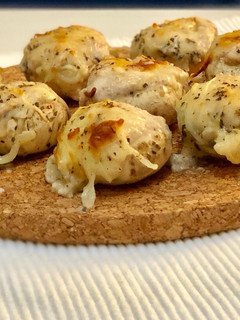 Una foto de Champiñones rellenos de bacon y queso al horno