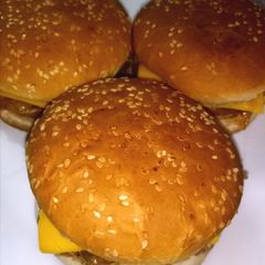 Cheesy chicken and vegetable burger A picture of Cheesy chicken and vegetable burger.