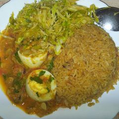 Rice and egg curry and steamed cabbage #jikoni weekly challenge A picture of Rice and egg curry and steamed cabbage #jikoni weekly challenge.