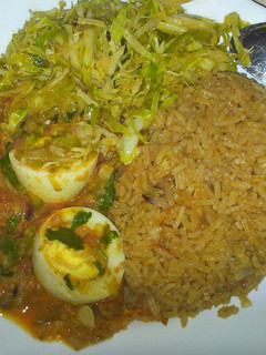 A picture of Rice and egg curry and steamed cabbage #jikoni weekly challenge.