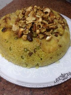 صورة لوصفة مقلوبه البطاطس والزهره بالأرز المصري