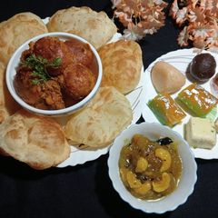 A picture of Luchi & Cocoa Potato Curry (Puri sabji).