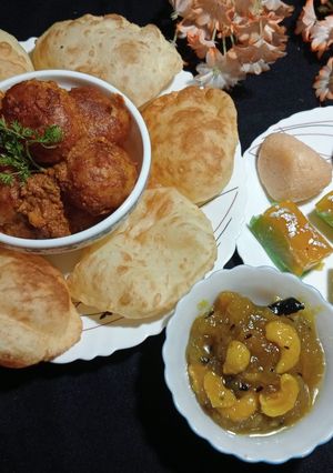 A picture of Luchi & Cocoa Potato Curry (Puri sabji).