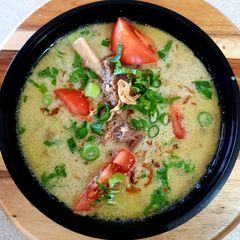 A picture of SOTO BETAWI KUAH SANTAN (SPICED SOUP).