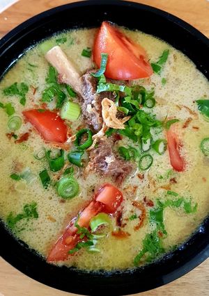 A picture of SOTO BETAWI KUAH SANTAN (SPICED SOUP).