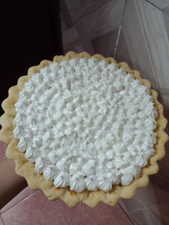Una foto de Tarta dulce (rellena de dulce de leche y duraznos)