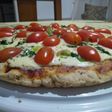 Pizza integral de tomate y verdeo