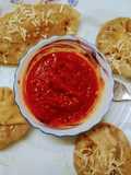 Cheese  vegetables  Dumplings  With Red Sauce