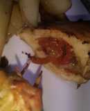 Pollo relleno y papas al horno