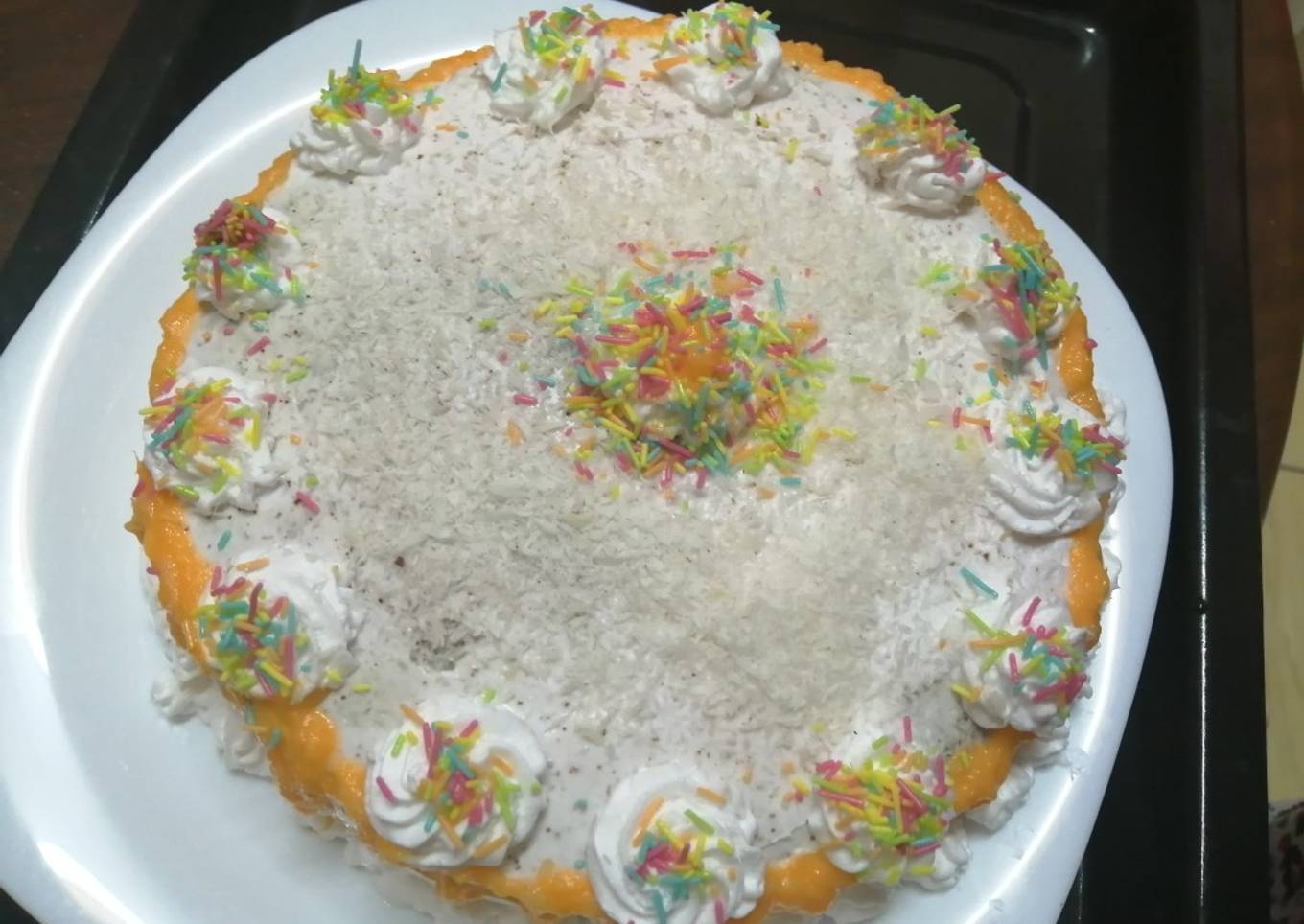 White chocolate drips and Sprinkles for decorating the cake