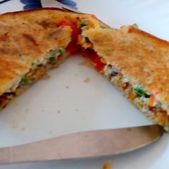 A picture of Egg Bread Toast with veggies.