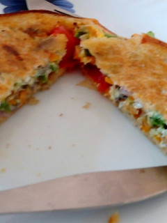 A picture of Egg Bread Toast with veggies.
