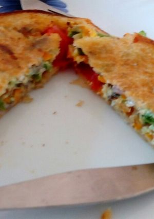 A picture of Egg Bread Toast with veggies.