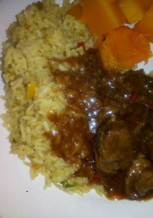 A picture of Beef stew with Rice.