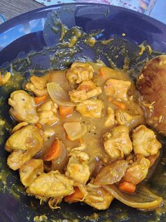 Una foto de Pollo al curry