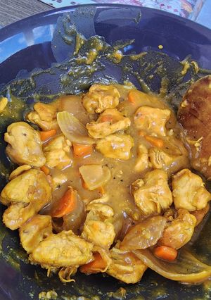 Una foto de Pollo al curry