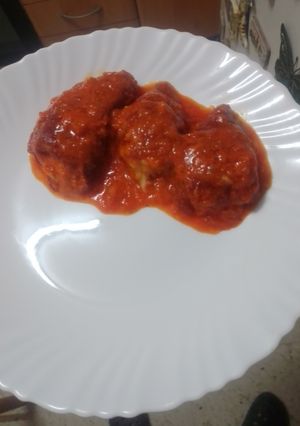 Una foto de Pimientos rellenos en salsa