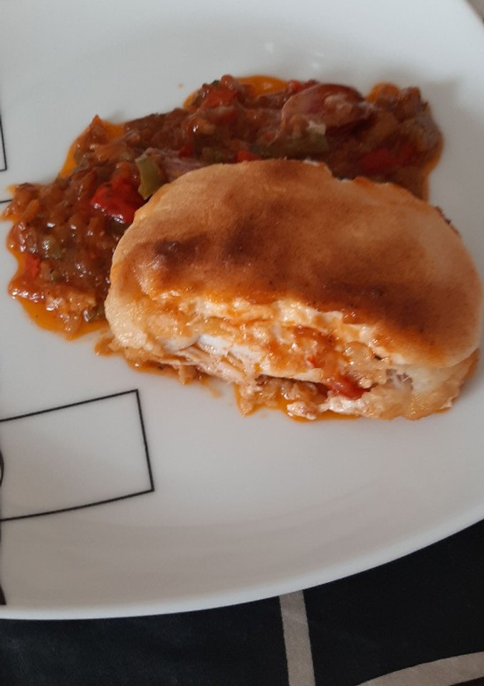 Una foto de Lomos de bacalao con sanfaina y all i olli gratinado