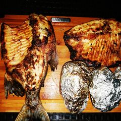 A picture of BBQ Fish and potatoes.