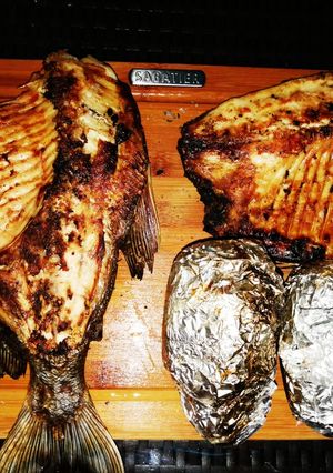A picture of BBQ Fish and potatoes.