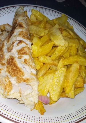 A picture of Chips with fried egg.