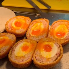 Maple bacon scotch eggs A picture of Maple bacon scotch eggs.