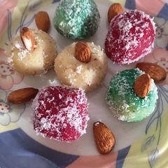 A picture of Colour full coconut ladoo.