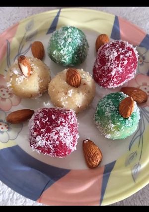 A picture of Colour full coconut ladoo.
