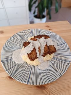 Una foto de Seitán con salsa de trufa