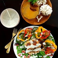 A picture of Yoghurt paprika tilapia with blue cheese dressing.