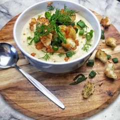 A picture of Vegan cheesy roast cauliflower soup.