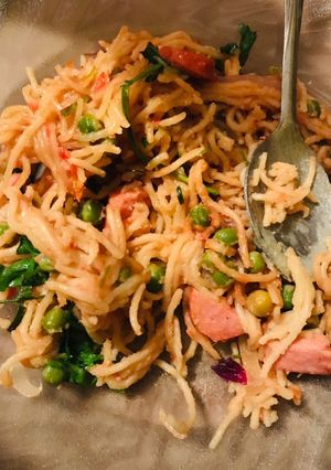 A picture of Spaghetti and sausage.