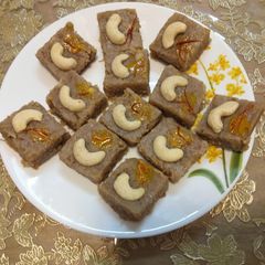 A picture of Pheni and dry fruit burfi.