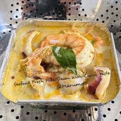 Seafood Fresh Milk Steam With Curry Paste A picture of Seafood Fresh Milk Steam With Curry Paste.