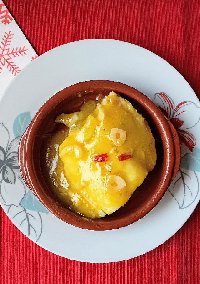 Una foto de Bacalao al pil pil