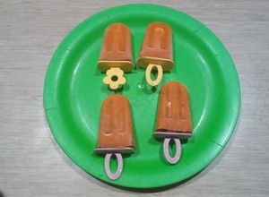 Una foto de Polo de naranja y albaricoques