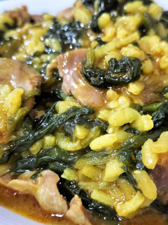 Una foto de Arroz meloso con mollejas y espinacas