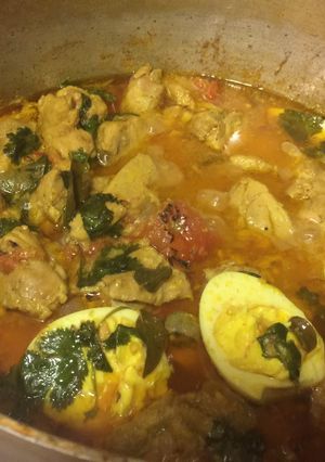 A picture of Chicken Korma and Hard Boiled Eggs.