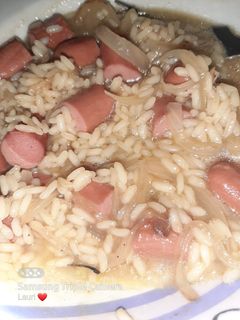 Una foto de Salchichas al vino con arroz