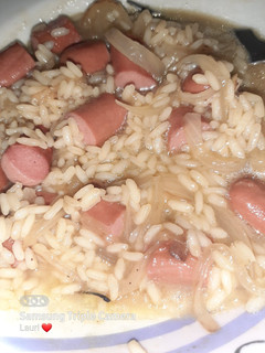 Una foto de Salchichas al vino con arroz