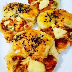 A picture of Chicken cheese stuffed pocket.. Cookpad 5 challenge with Huma.
