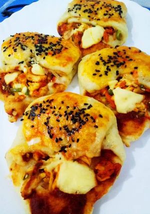 A picture of Chicken cheese stuffed pocket.. Cookpad 5 challenge with Huma.