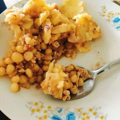 A picture of Egg Fried Corn with Skillet Potatoes.