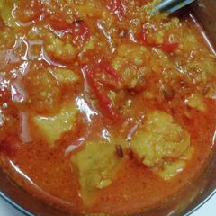 A picture of Fried Besan kadhi.